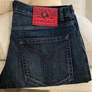 Versace Dark Blue Jeans with Medusa on the back. Size 32 and not worn at all.